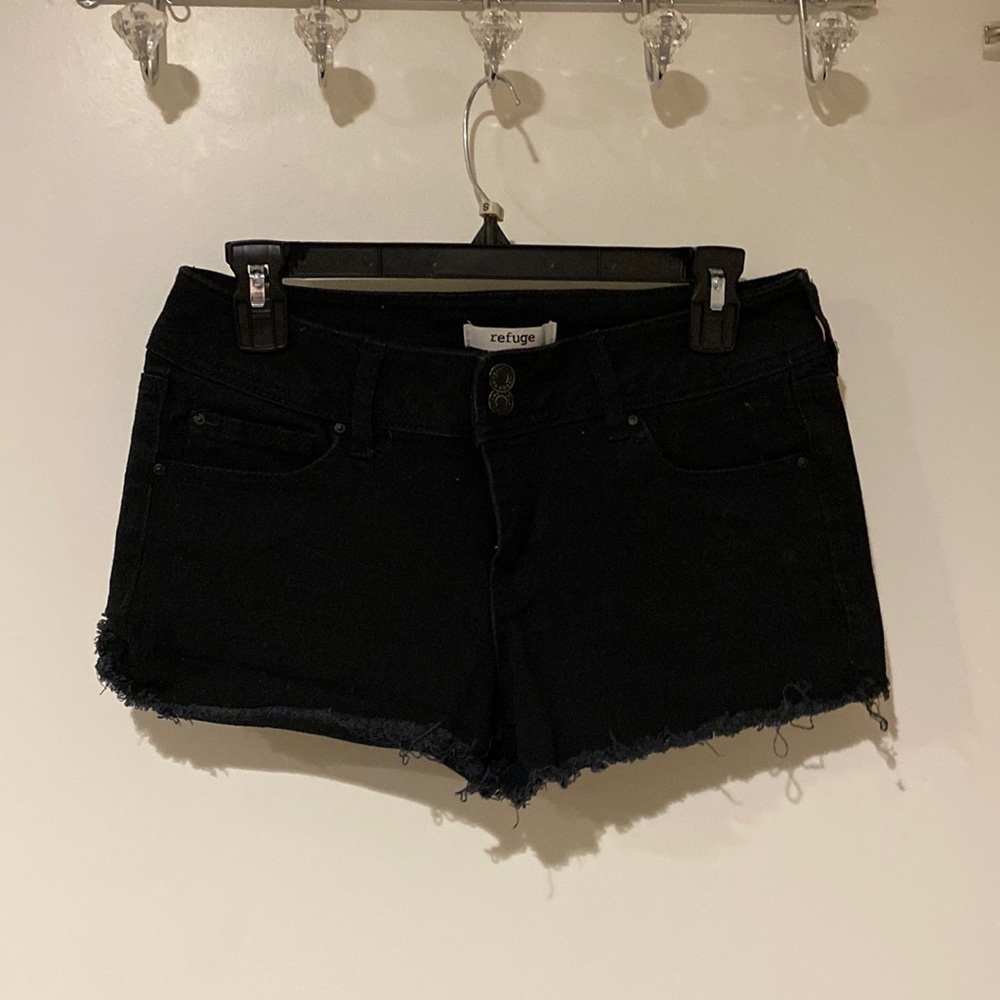 Black ripped shorts